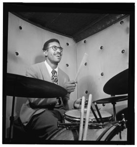 Max Roach at the Three Deuces Club in New York in October 1947. From the William P. Gottlieb Collection.